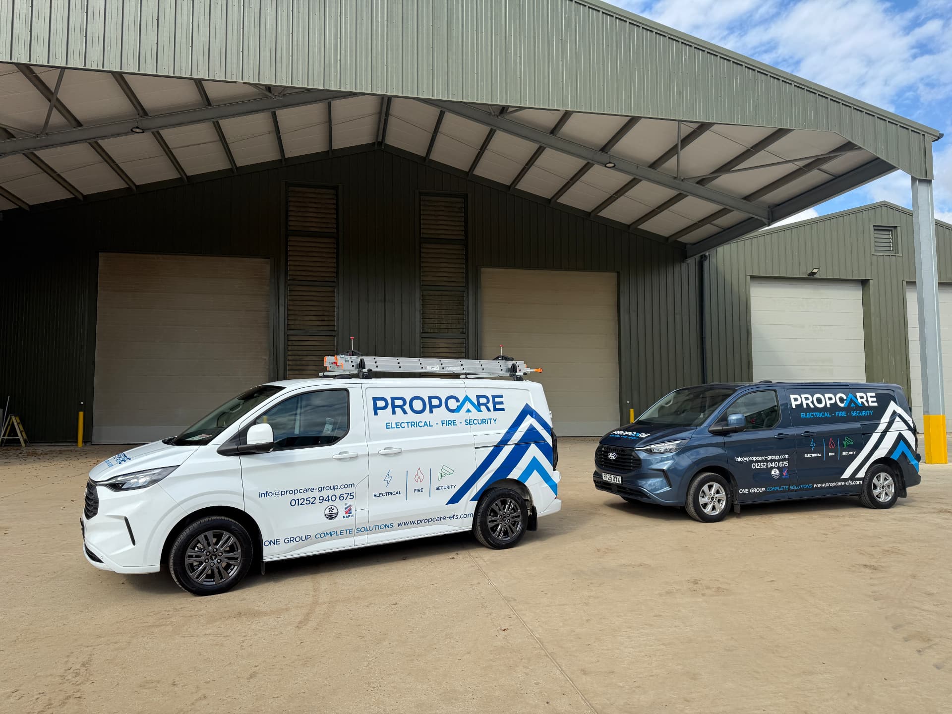 Two Propcare EFS branded vans outside the depot